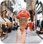 Girl holding ice-cream on the street